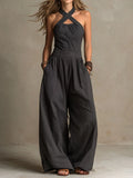 Bianca - Tuta jumpsuit grigia con scollo incrociato dal taglio sofisticato