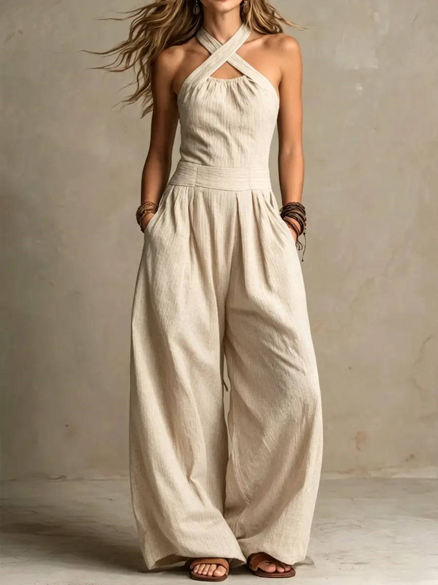 Bianca - Tuta jumpsuit grigia con scollo incrociato dal taglio sofisticato